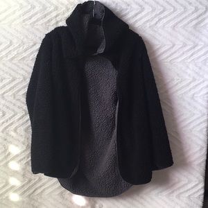 Hooded Sherpa oversized  weatherproof jacket with pockets.